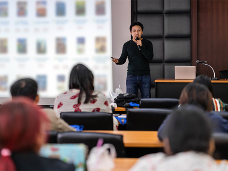 asian-speaker-or-lecture-with-casual-suit-on-the-s-2024-02-23-05-04-22-utc